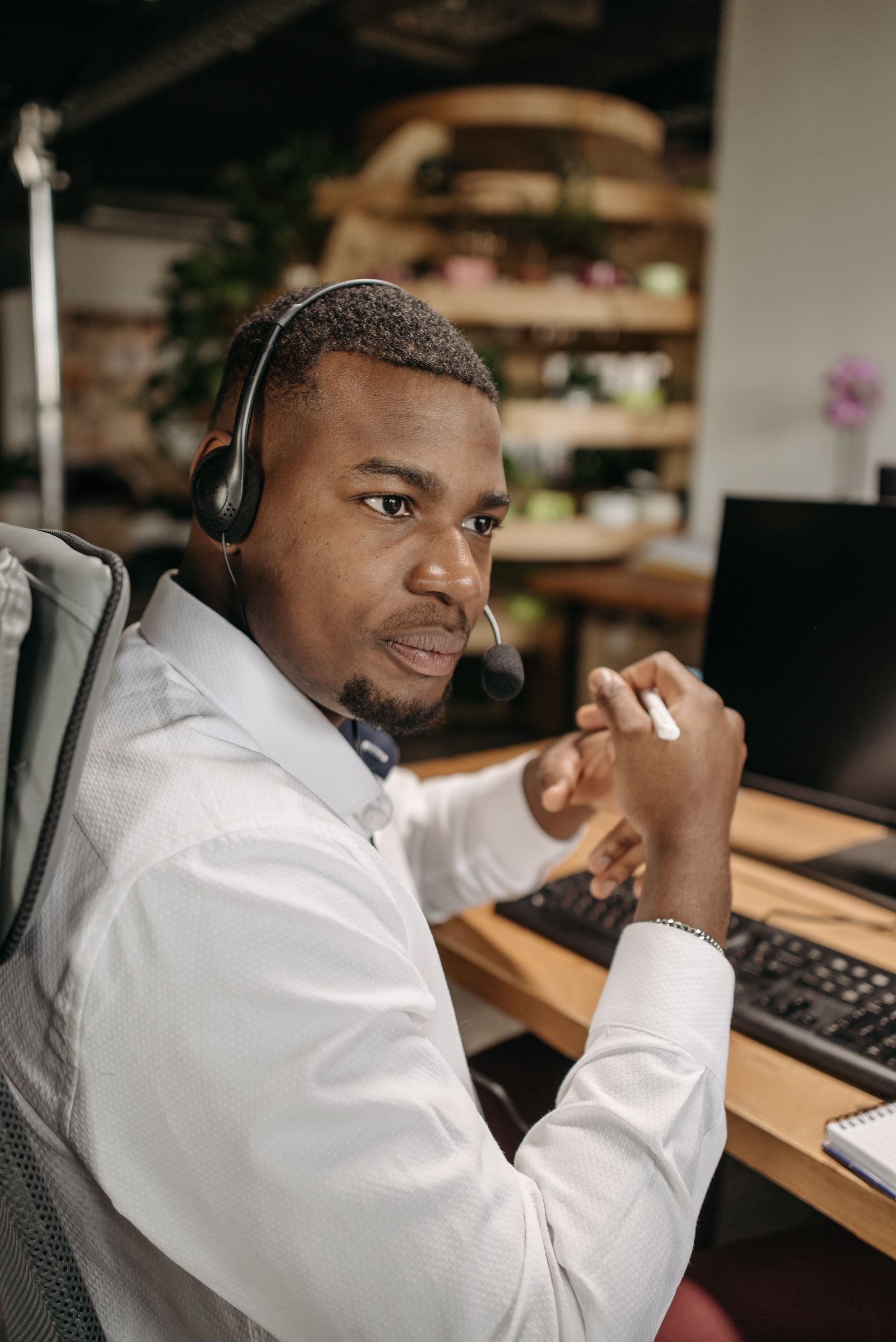 Customer support specialist on a headset call